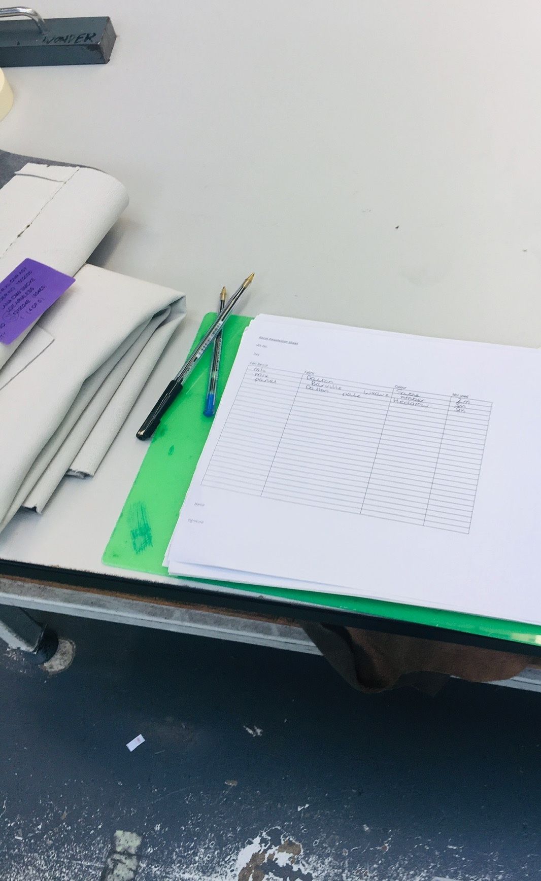 A paper order sheet on a desk in the order management office